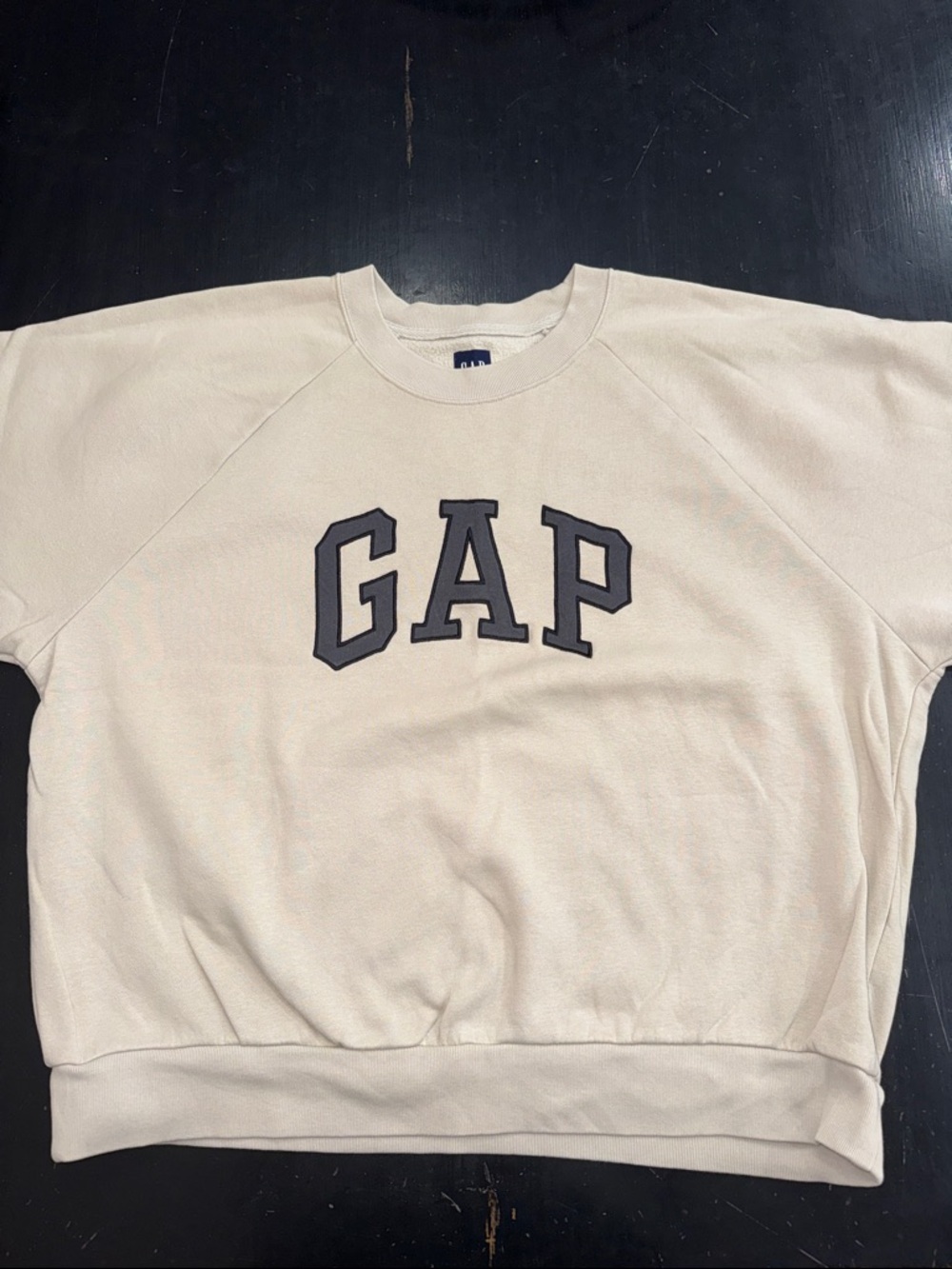 GAP logo crew neck sweatshirt. light tan with black appliqué letters. size XL.